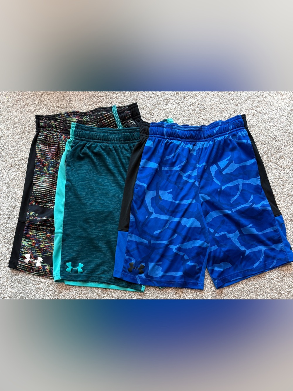 Youth medium Under Armour shorts.  See photos for flaws.